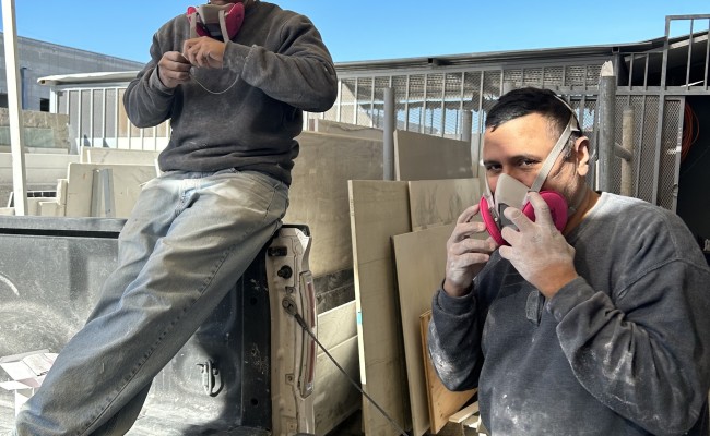 Granite Countertop Workers receiving respirator masks