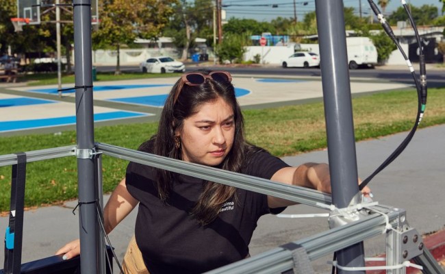 Melanie Paola Torres works on Cool Street equipment