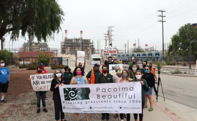 Residents and activists protest outside the LADWP plant in Sun Valley