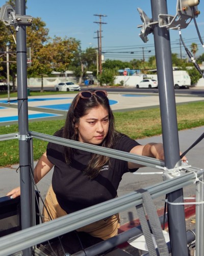Melanie Paola Torres works on Cool Street equipment