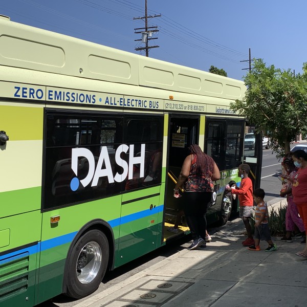 Community Members boarding DASH bus