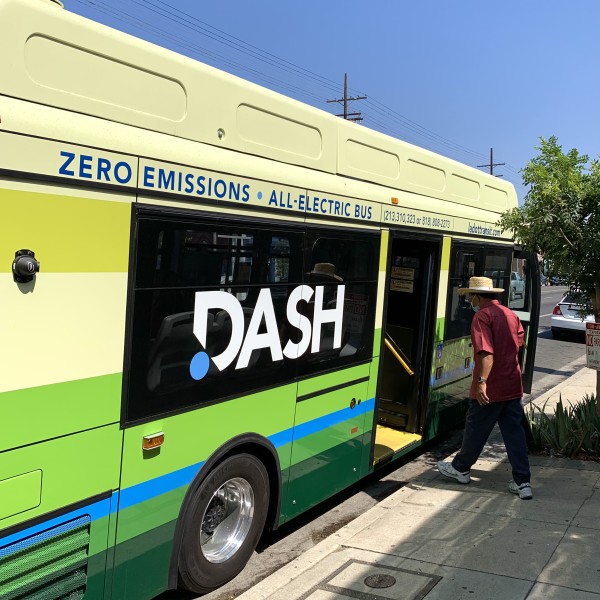 Community member boarding bus