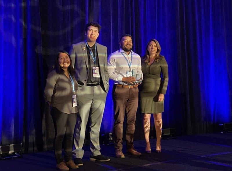 2019 AQMD award winners: Carlos Regalado, Yesenia Cruz and Diego Ortiz with Vanessa Delgado, AQMD board member